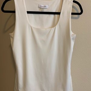 Sleeveless Calvin Klein blouse.